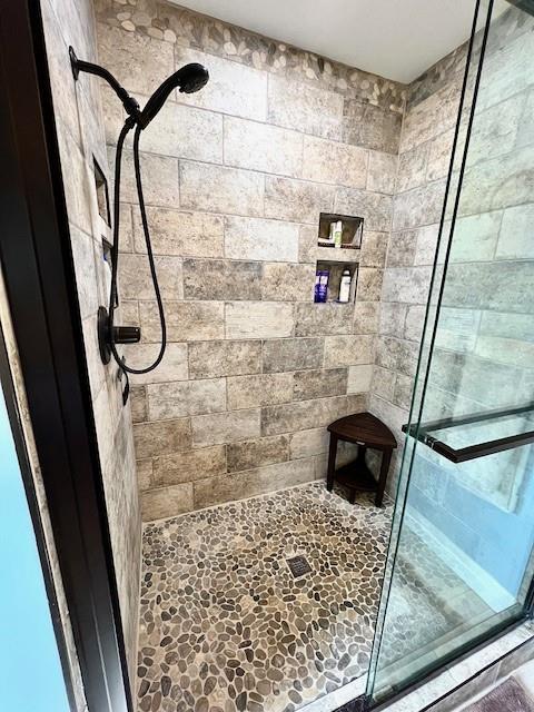 19 Magnolia Ct NE, Rydal, GA 30171 - full bath with a shower stall and stone finish floors