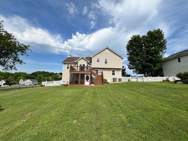 19 Magnolia Ct NE, Rydal, GA 30171 - rear view of house with stairs and a deck