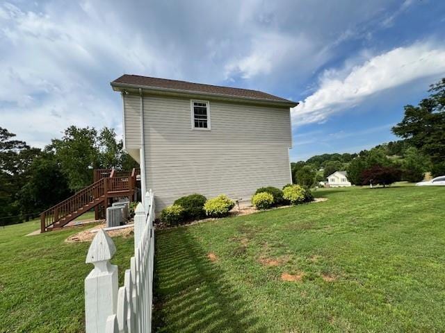 19 Magnolia Ct NE, Rydal, GA 30171 - view of property exterior featuring stairway, a yard, and cooling unit