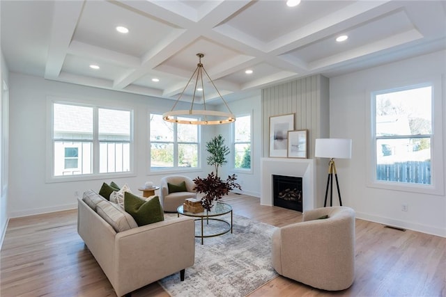 3395 Lee St, East Point, GA 30344 - living room with plenty of natural light, light wood-type flooring, and coffered ceiling