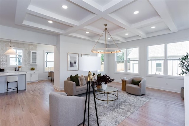 3395 Lee St, East Point, GA 30344 - living area featuring beam ceiling, a healthy amount of sunlight, and coffered ceiling