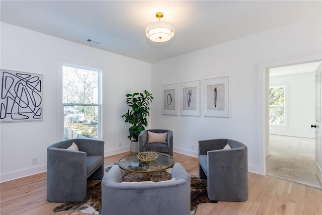 3395 Lee St, East Point, GA 30344 - living area with a wealth of natural light and light wood-style floors