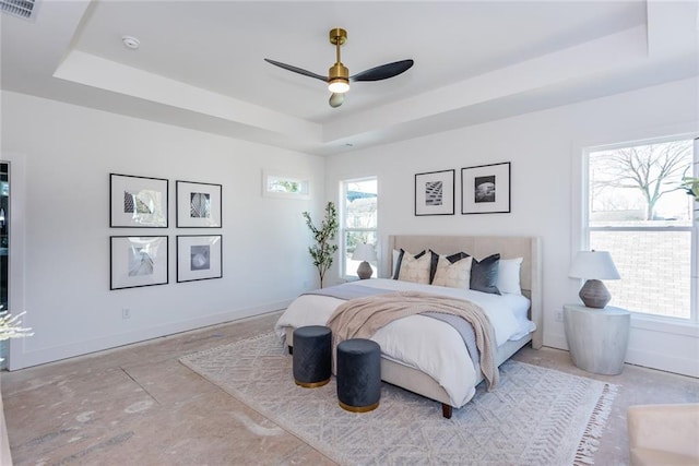 3395 Lee St, East Point, GA 30344 - bedroom with a ceiling fan, a raised ceiling, visible vents, and baseboards