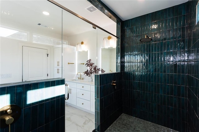 3395 Lee St, East Point, GA 30344 - bathroom featuring walk in shower, visible vents, marble finish floor, and vanity
