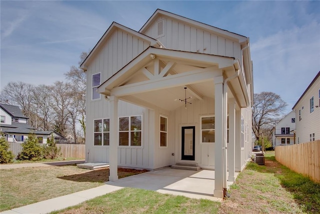 3395 Lee St, East Point, GA 30344 - view of front of property with fence, board and batten siding, a front yard, and entry steps