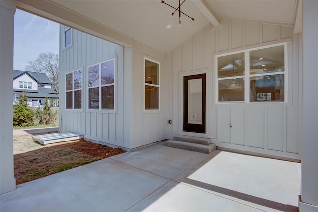 3395 Lee St, East Point, GA 30344 - doorway to property with a patio area and board and batten siding