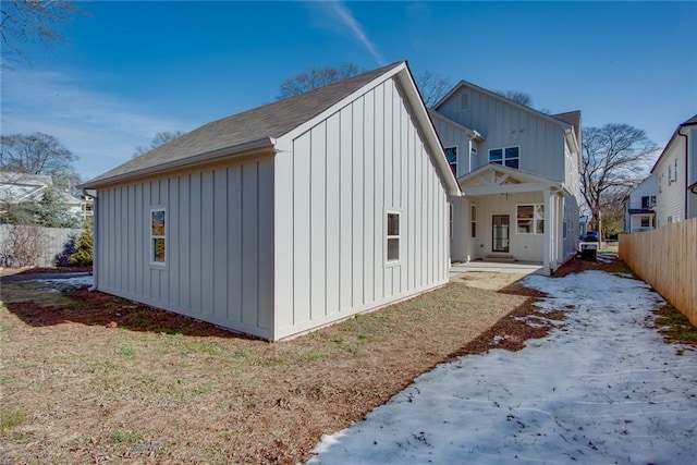 3395 Lee St, East Point, GA 30344 - view of side of property with board and batten siding and fence