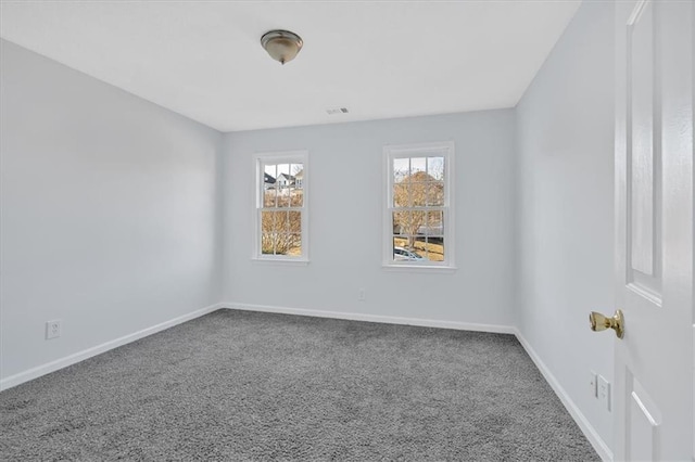 view of carpeted spare room