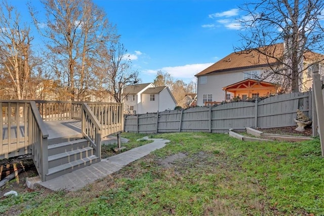 view of yard featuring a deck