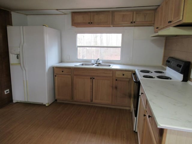 1779 New Bridge Rd, Cleveland, GA 30528 - kitchen with white refrigerator with ice dispenser, a sink, range with electric stovetop, under cabinet range hood, and wood finished floors