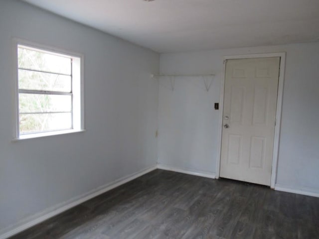 1779 New Bridge Rd, Cleveland, GA 30528 - spare room featuring dark wood finished floors and baseboards