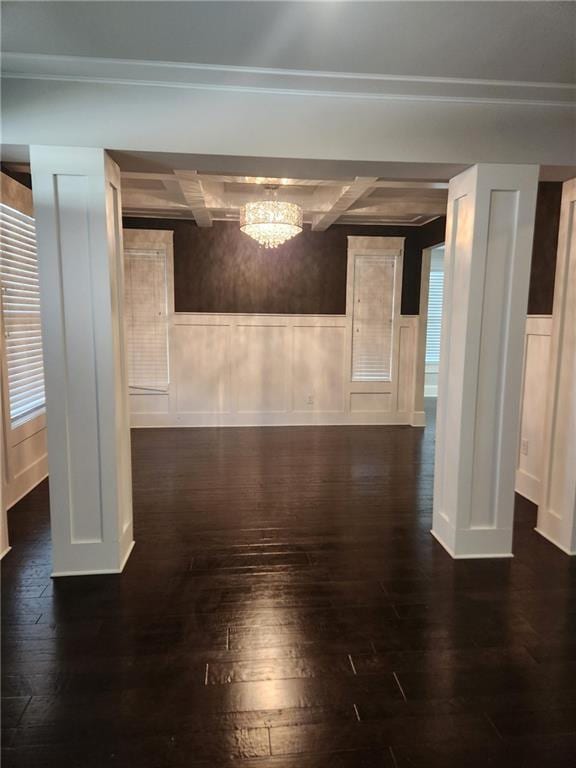 2439 Muirfield Pl, Atlanta, GA 30337 - corridor featuring a wainscoted wall, dark wood-style flooring, a decorative wall, and a chandelier