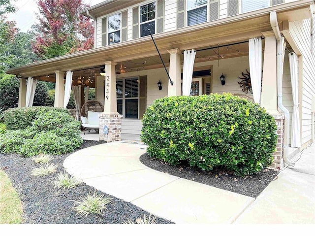 2439 Muirfield Pl, Atlanta, GA 30337 - view of exterior entry featuring covered porch