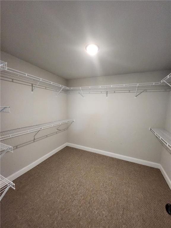 2439 Muirfield Pl, Atlanta, GA 30337 - spacious closet featuring carpet
