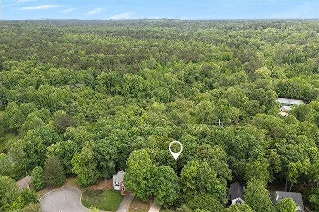 bird's eye view featuring a view of trees