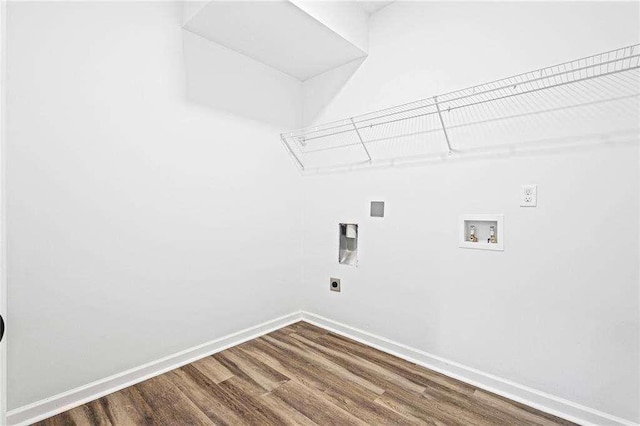 laundry room with hookup for an electric dryer, laundry area, washer hookup, baseboards, and dark wood-style floors