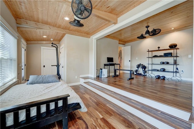 bedroom featuring recessed lighting, wood finished floors, wood ceiling, baseboards, and beamed ceiling