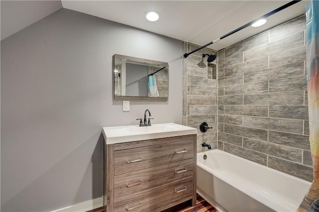 bathroom with vanity and shower / bath combo with shower curtain