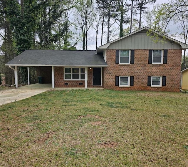 split level home featuring board and batten siding, driveway, a front yard, brick siding, and an attached carport