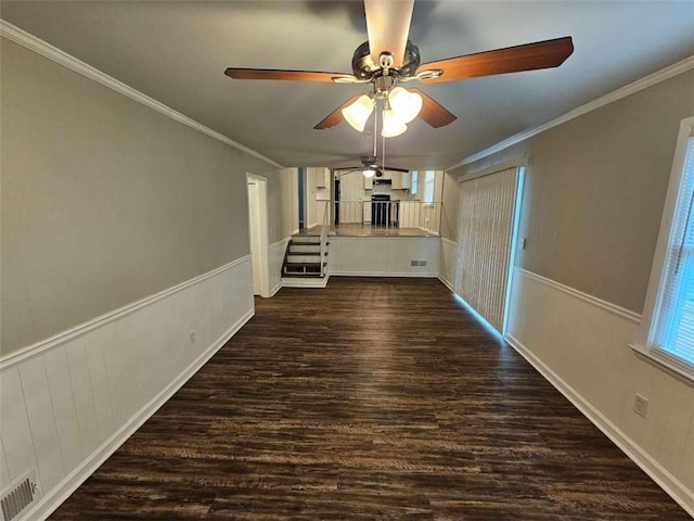 unfurnished bedroom featuring baseboards, multiple windows, carpet flooring, and a textured ceiling