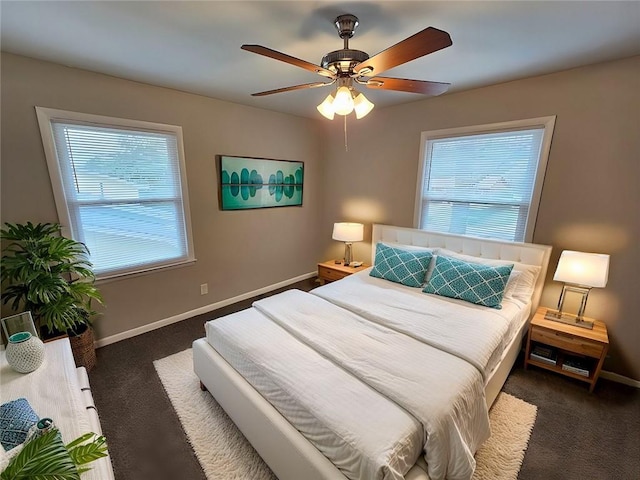 unfurnished bedroom with a closet, dark colored carpet, baseboards, visible vents, and ornamental molding