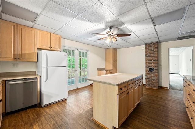 kitchen with freestanding refrigerator, stainless steel dishwasher, dark wood-style floors, ceiling fan, and a paneled ceiling