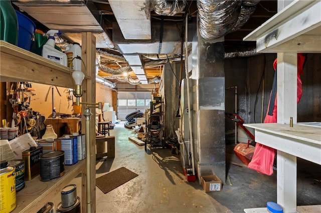 basement with a workshop area