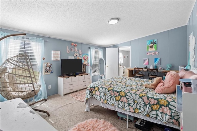 carpeted bedroom with a textured ceiling