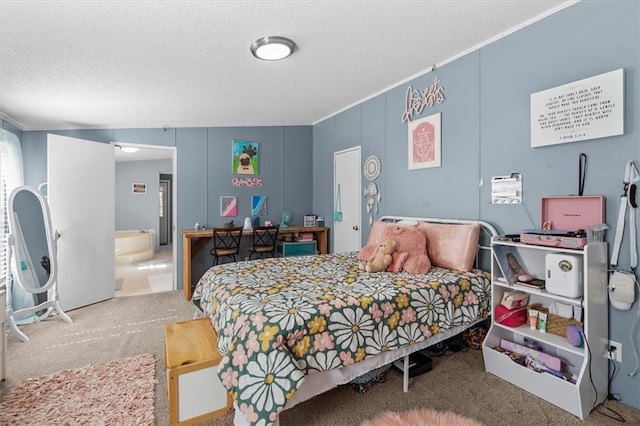 bedroom featuring carpet floors and a textured ceiling