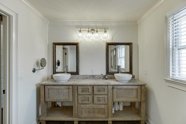 bathroom featuring vanity and ornamental molding