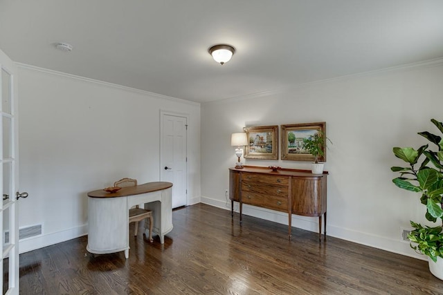 interior space featuring dark hardwood / wood-style floors and ornamental molding