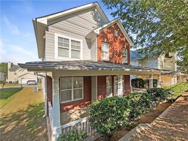 view of front of home featuring covered porch