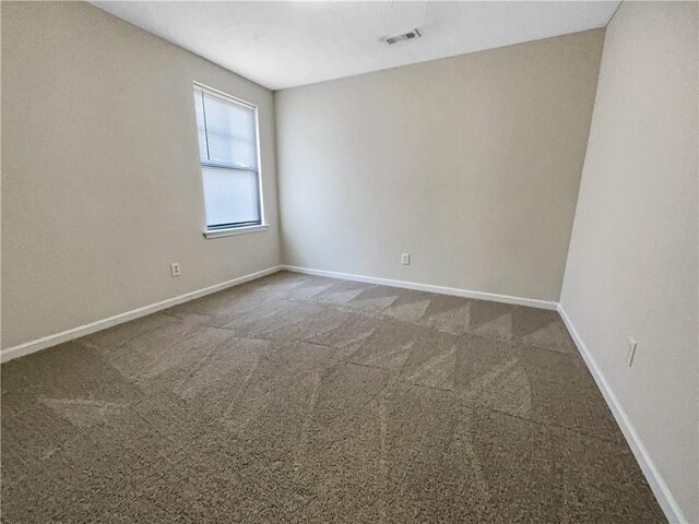 bathroom with tile patterned floors and toilet