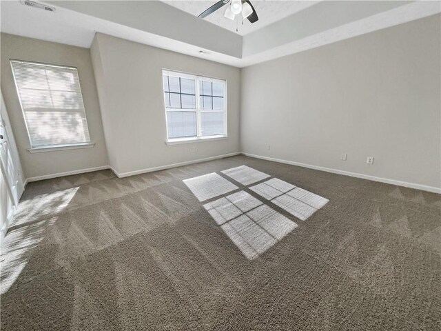 carpeted empty room with ceiling fan