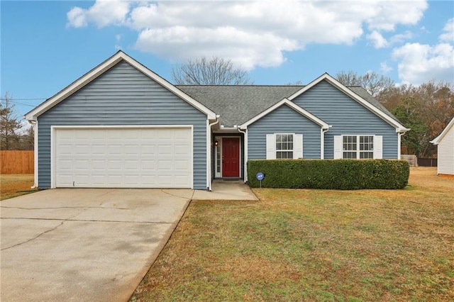 single story home with a garage and a front lawn