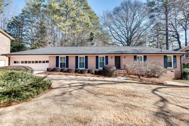 single story home featuring a garage