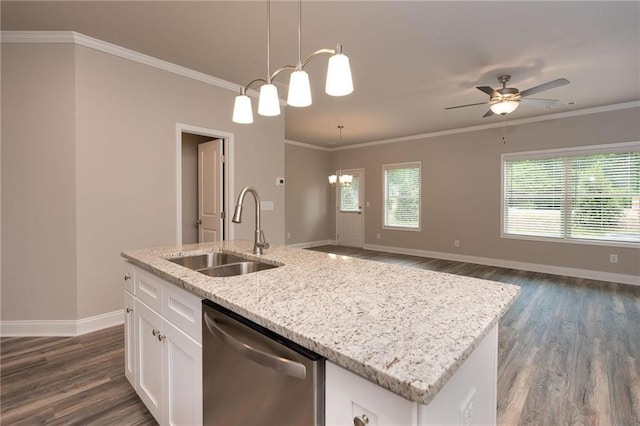 kitchen with sink, dishwasher, hanging light fixtures, white cabinets, and a center island with sink