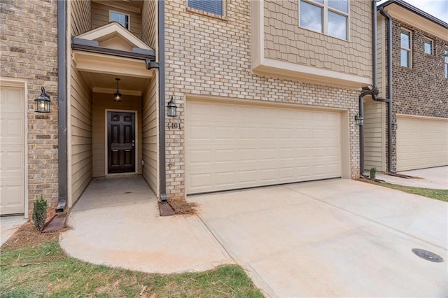 property entrance with a garage