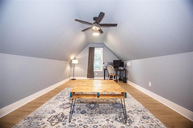 office featuring hardwood / wood-style flooring, vaulted ceiling, and ceiling fan