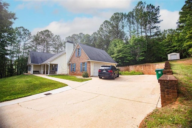 view of property exterior with a garage, a yard, and an outdoor structure