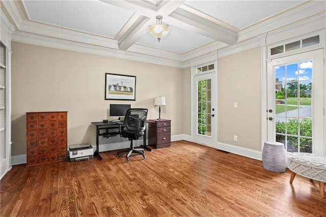 office space featuring crown molding, wood finished floors, coffered ceiling, beam ceiling, and baseboards