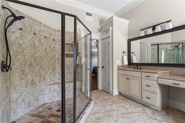 bathroom with ornamental molding, a stall shower, and vanity