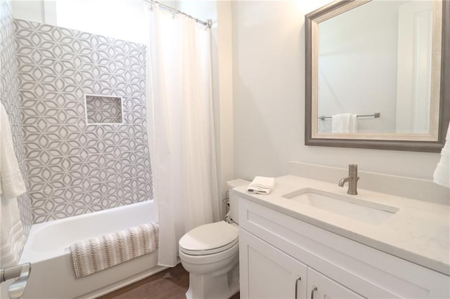 50 Quiet Cove Way, Monticello, GA 31064 - bathroom featuring vanity, toilet, shower / bathtub combination with curtain, and wood finished floors