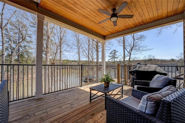 50 Quiet Cove Way, Monticello, GA 31064 - wooden deck with a water view and ceiling fan