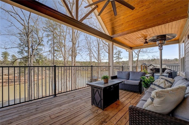 50 Quiet Cove Way, Monticello, GA 31064 - wooden deck with a ceiling fan and an outdoor living space