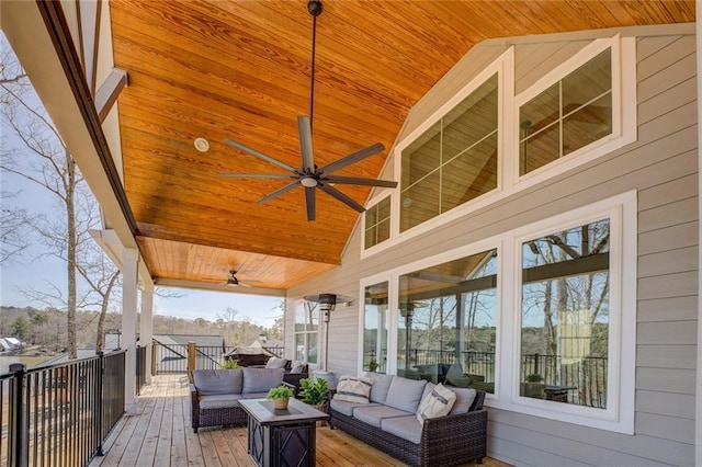 50 Quiet Cove Way, Monticello, GA 31064 - wooden terrace with an outdoor living space and a ceiling fan