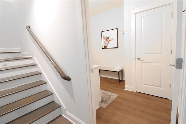50 Quiet Cove Way, Monticello, GA 31064 - stairway with wood finished floors and baseboards