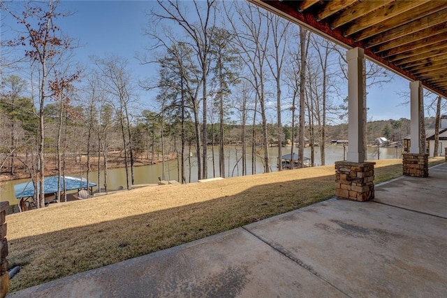 50 Quiet Cove Way, Monticello, GA 31064 - view of grassy yard featuring a water view and a patio