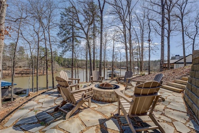 50 Quiet Cove Way, Monticello, GA 31064 - view of patio / terrace featuring an outdoor fire pit and a water view