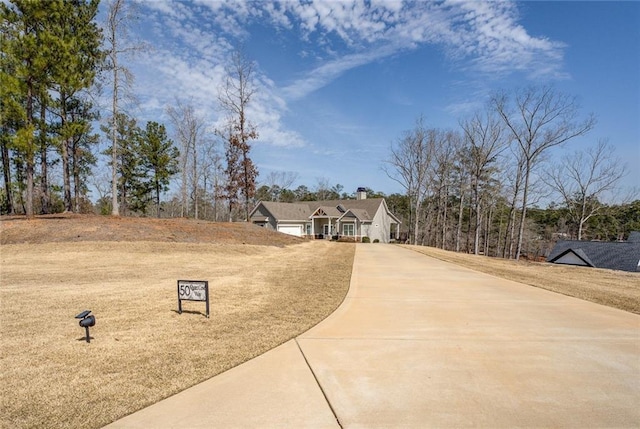 50 Quiet Cove Way, Monticello, GA 31064 - view of front facade featuring driveway